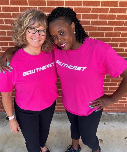 Logan and Gary in pink Southeast shirts